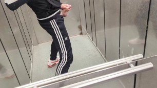 Risky jerk off in a public elevator